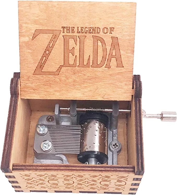 The Legend of Zelda Music Box Hand Crank Musical Box منحوتة صناديق موسيقى خشبية صغيرة الحجم ، Play Zelda: Song of Storms from Ocarina of Time ، بني - B07FCQYYL1
